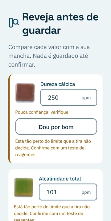 Ecrã de revisão: cada quadrado com o seu valor e um aviso de pouca confiança